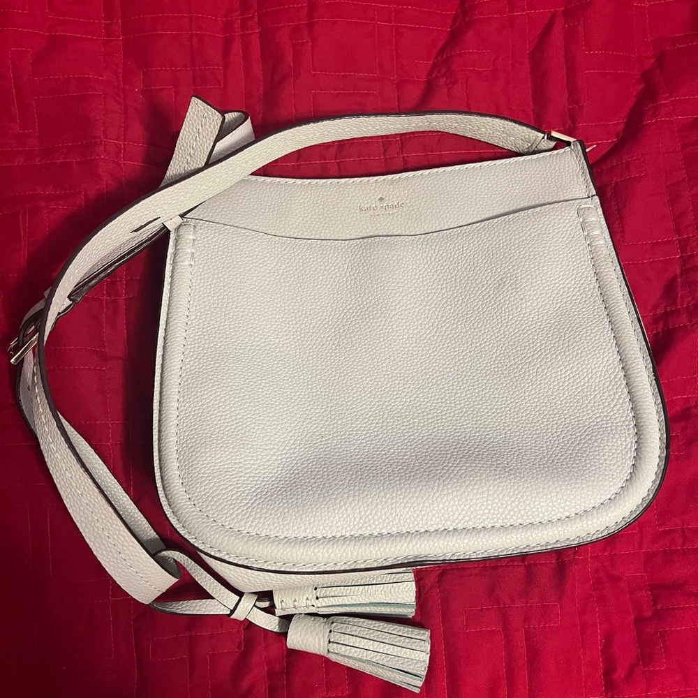 Beautiful Crossbody Kate Spade Bag with Tassel.